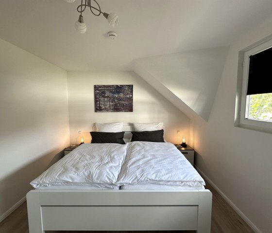 Schlafzimmer mit Doppelbett, &copy; Tobi's Eifelhaus