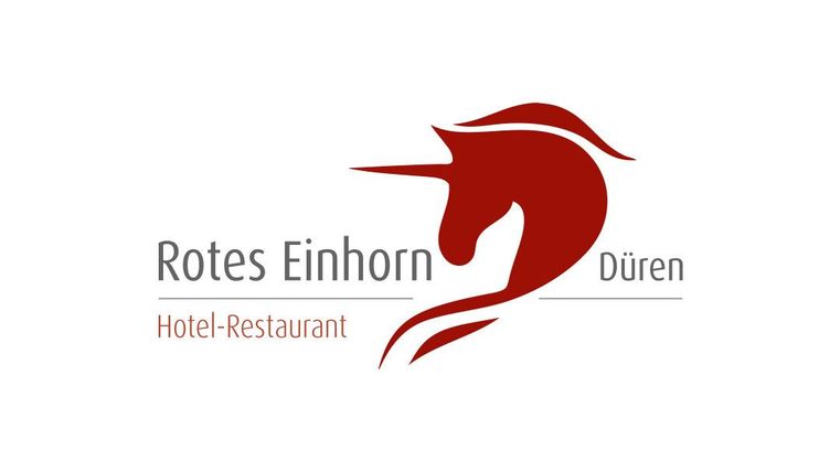 Ein Logo für das Hotel-Restaurant "Rotes Einhorn" in Düren. Es zeigt einen stilisierten roten Einhornkopf.